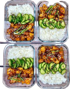 four glass containers filled with rice and chicken covered in cucumber slices, green onions, and sesame seeds