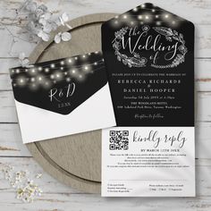 an image of wedding card with lights on the front and back, next to a white envelope