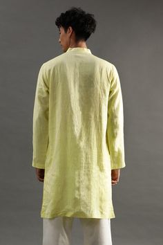 Lime linen kurta with gota hand embroidered placket and side pockets. Comes with white pyjama.
Components: 2
Pattern: Hand embroidered
Type Of Work: Gota
Neckline: Band collar
Sleeve Type: Full
Fabric: Linen
Color: Yellow
Other Details: 
Closure : Front buttons
Occasion: Mehendi and Puja,Sangeet - Aza Fashions Relaxed Fit Long Sleeve Linen Kurta, Traditional Long Sleeve Kurta With Relaxed Fit, Spring Linen Kurta With Relaxed Fit, Traditional Long Sleeve Linen Kurta, Fitted Linen Kurta With Chikankari Embroidery, Long Sleeve Linen Kurta With Chikankari Embroidery, White Pajamas, Linen Color, Fashion App