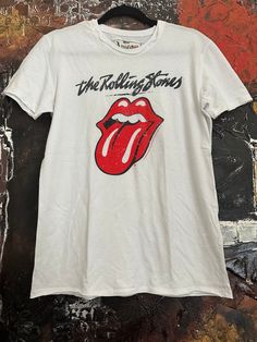 Vintage The Rolling Stones White T-shirt. We ship worldwide. Thank you for your shopping. Mens T Shirts, Mens Graphic Tee, Rolling Stones, White T Shirt, Fancy Dresses, White Tshirt, Mens Graphic, Tee Shirts, Graphic Tees