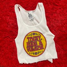 Ribbed tank with a TACKY, RUDE & VULGAR handpressed graphic inspired by 70's & 80's bikers. All tanks will have a cut hem. If you want it extra shredded, let us know and we'll add holes, tears, wear marks etc... Want it cropped? Leave us a note! Available in unisex xs-xxl. Chest Measurements  : XS (boys XL) - 32"- 34" S - 34"- 36" M - 38" - 40" L - 42" - 44" XL - 46" - 48" XXL - 50" - 52" Stay up to date on new items by following us on Instagram: @shophothoney ------ Imperfections & wear add cha Silly Shirt, Ribbed Tank, Infant Tees, Fashion Inspo Outfits, Vintage Inspired, Personal Style, Cool Outfits, Outfit Inspirations, Summer Outfits