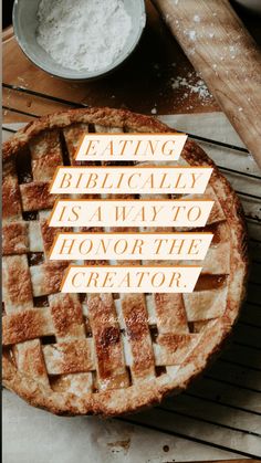 a pie with the words eating biblically is way to honor the creator