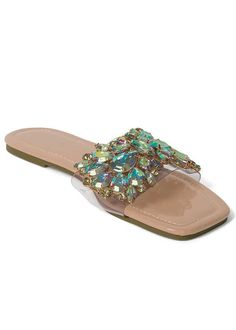 Casual style gets an upgrade with these sparkly slide-on sandals! Large rhinestone embellishments in muted summertime colors span across the wide foot strap for eye-catching glam. Easy to pack for vacay or to wear every day, these sandals bring elevated style to all your favorite looks. Summer Vacation Sandals With Rhinestones, Glamorous Multicolor Open Toe Sandals, Multicolor Rhinestone Sandals For Spring, Trendy Open Toe Sandals With Rhinestones, Trendy Rhinestone Open Toe Sandals, Multicolor Rhinestone Sandals For Summer, Flat Rhinestone Sandals For Summer, Summer Rhinestone Open Toe Flip Flops, Summer Multicolor Sandals With Rhinestones