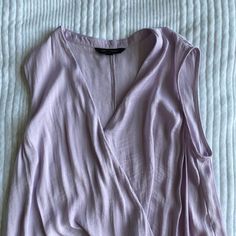 The Pictures Don’t Do The Color Justice! It’s An Amethyst Lavender. Truly Gorgeous And Lovely Flowy Silky Material Never Worn But No Tags. Size Small! Lavender Tops For Spring Layering, Spring Lavender V-neck Blouse, Lavender V-neck Summer Blouse, Spring Lavender V-neck Top, Lavender V-neck Blouse For Spring, Chic Mauve Blouse For Summer, Purple V-neck Top For Day Out, Chic Mauve Tops For Day Out, Purple Sleeveless Blouse For Spring