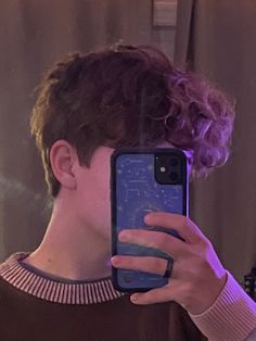 Boy with short brown hair in purple and yellow low light, holding phone Shaved Hairstyles Men, Trans Masc Haircut Short, Indie Boy Hair, Gay Haircut Men, Short Haircuts Men, Trans Man Haircut, Trans Guy Haircut, Boy Haircut