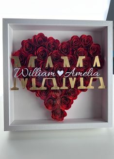 a heart shaped box with the words william and martha in gold foil on it's side