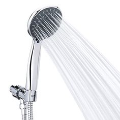 the shower head is open with water flowing from it