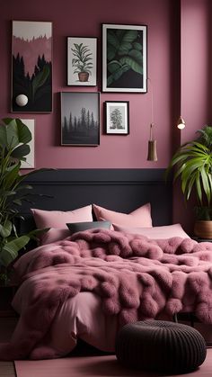 a bedroom with pink walls, plants and pictures on the wall