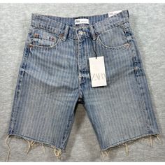 Stylish Mid-Rise Denim Shorts With A Bermuda Length And Frayed Hem, Ideal For Casual Wear. Mid Rise Bermuda Length Striped Design Frayed Hem Button & Zip Closure Five Pockets Waist = 28 Inches Rise: 10.5 Inches Inseam: 8 Inches Size: Womens 4 Condition: New With Tags Shipping Discount: Take Advantage Of Combined Shipping With A Bundle Of Two Or More Items From My Closet. Simply Add Two Or More Items To Your Bundle, And The Discount Will Be Applied Automatically During Checkout! Dark Wash Short Leg Jeans For Spring, Spring Dark Wash Short Leg Jeans, Dark Wash Short Length Jeans For Spring, Zara Bottoms Medium Wash With Five Pockets, Zara Medium Wash Bottoms With Five Pockets, Zara Cotton Short Jeans, Zara Mid-rise Denim Blue Shorts, Zara Denim Blue Shorts, Zara Jeans With Frayed Hem In Short Length