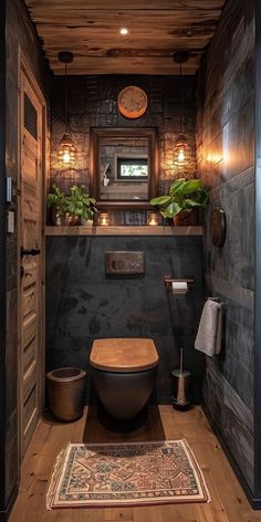 a rustic bathroom with wood paneling and stone walls, along with a rug on the floor