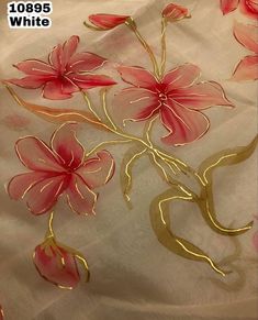 pink flowers on white fabric with gold trim