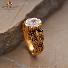 Be a divine presence when you adorn this intricate Lord Ganesh ring studded with stone. We are open from 10 am to 8 pm 𝐋 𝐨 𝐜 𝐚 𝐭 𝐢 𝐨 𝐧 : M.G. ROAD, JAYANAGAR, RAJAJINAGAR, C T STREET For Enquiry: +91 9108701007 #navrathan #navrathanjewellers #jewelers #jewellerydesign #JewelleryAddicts #jewellerylovers #expressyourself #jewelryaddict #classyjewelry #luxuryjewelry #timeless #grace #signature #opulence #antiquebangles #brides #signaturecampaign #luxury #bespoke #signaturejewellery #emerald Gold Pendants For Men, Mens Ring Designs, Antique Gold Rings, Gold Temple Jewellery, Rings Men, Gold Bangles For Women, Black Beads Mangalsutra Design, Mens Jewellery, New Gold Jewellery Designs