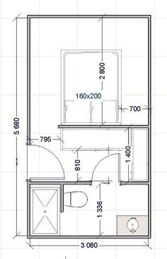 the floor plan for a small bathroom with toilet, sink and bathtub in it