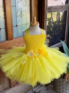 "Welcome to Baby/Infants Clothing by Funkids&Us Boutique This beautiful handmade Princess-inspired tutu dress is perfect for birthday parties or any occasion. This dress is absolutely beautiful and every little Girl love to wear it. It is made of yellow and glitter yellow soft Premium tulle, tulle skirt adds some glitter tulle.  The skirt is double layered of tulle strands. Crochet tutu top is soft and stretchable design with fabric flowers.  MADE TO ORDER - KNEE LENGTH TUTU DRESS  AVAILABLE COL Yellow Short Dress, Short Tutu, Tutu Top, Short Yellow Dress, Crochet Tutu, Princess Tutu Dress, Yellow Soft, Princess Tutu, Yellow Short