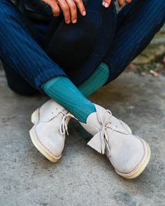 Our iconic Clarks Originals Desert Boots, crafted from soft sand suede. Designed in 1949 by Nathan Clark the Desert Boot was inspired by a rough boot from Cairo's Old Bazaar. An instant hit, it became the footwear choice for off-duty army officers. The suede is teamed with clean lines, an unfussy lace fastening and our signature crepe sole. #ClarksShoes #DesertBoots Footwear Sandals, Red Wing Boots, Boots Accessories, Shoes Trendy, Fashionable Shoes, Trendy Sandals