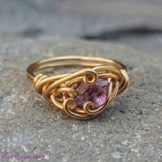 Stone: Amethyst Crystals Location: Tanzania This is for one gold colored tarnish resistant brass ring similar to the one pictured. Each stone and ring is unique so appearances may vary slightly.  Any size available. Please specify which size you would like when placing your order.  Message me for custom orders or wholesale orders. Adjustable Gold Amethyst Ring Gift, Gold Amethyst Crystal Ring With Gemstone, Gold Amethyst Ring Spiritual Style, Gold Amethyst Ring With Spiritual Style, Handmade Gold Amethyst Ring, Gold Amethyst Ring For Promise, Gold Amethyst Jewelry For Promise, Gold Amethyst Ring For Anniversary - Spiritual Style, Gold Amethyst Ring For Anniversary