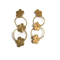 You will definitely make a statement in these playful large gold hoops. Small hoops thread through delicate flowers The post earrings were fabricated from heavy gage sterling silver wire, each individual circle formed and shaped and joined . Plated in 18 K gold with a satin finish.  Extremely light weight with nice movement and play on the ear.   These will be sure to attract attention and get you noticed Size The hoops measure mm  just shy of 2" from the top of post.  The largest hoop  is 22 mm Large Gold Ring, Multi Ring, Geode Earrings, Silver Flower Earrings, Ring Flower, Mini Hoop Earrings, Delicate Flowers, Brass Jewelry, Earrings Boho