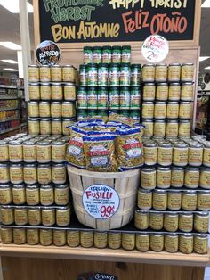 a display in a store filled with lots of canned food