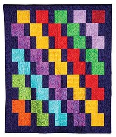 a colorful quilt with squares on it