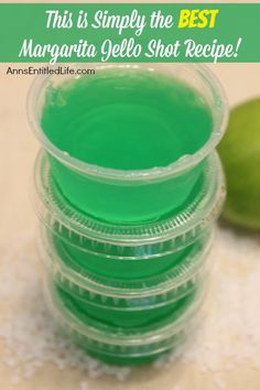 green jello shot recipe with limes in the background and text overlay that reads, this is simply the best margarita jello shot recipe