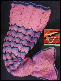 a crocheted hat and scarf are shown in pink, blue, and purple