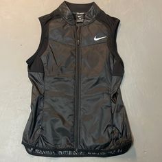 New Without Tags Nike Bodywarmer, Nike Sleeveless Sports Vest, Nylon Sleeveless Gym Vest, Sleeveless Nylon Sports Vest, Nike Sleeveless Go-dry Tank Top, Black Moisture-wicking Running Vest, Nike Vest, Black Nikes, Nike Jacket