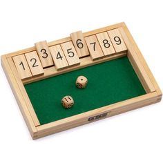 two dices and three numbers in a wooden box