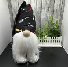 a gnome's head is sitting on top of a black table