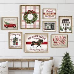 a white wall with christmas decorations and horse signs on it's side, including a bench