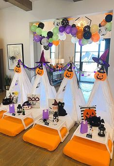 halloween decorations are set up in the living room