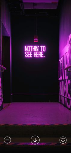 an empty room with purple lighting and graffiti on the walls that says, nothing to see here