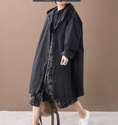 Long Women Casual Hooded Parka Plus Size Coat Jacket ,Custom make service available! Please feel free to contact us if you want custom made for this coat.Materials: cotton blendedMeasurement: One size fits all . length100cmbust 134cm Most of our coat are made of cotton linen fabric, soft and breathy. loose dresses to make you comfortable all the time.Flattering cut. Makes you look slimmer and matches easily.Payment:We accept payment by paypal and credit card. if you would like to pay by credit c Oversized Black Cotton Outerwear, Spring Long Coat Parka With Pockets, Black Cotton Windbreaker With Stand Collar, Black Windbreaker With Stand Collar For Spring, Long Cotton Parka With Pockets, Cotton Long Coat Parka With Pockets, Cotton Hooded Parka, Oversized Cotton Parka For Fall, Spring Cotton Hooded Long Jacket