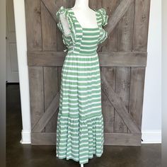 Euc Never Worn Ties At Waist Green Ruffle Sleeve Dress For Beach, Green Ruffled Sundress For Garden Party, Green Maxi Dress With Ruffled Straps For Brunch, White Ruffled Maxi Sundress, Striped Dresses With Ruffles For Day Out, Striped Ruffle Dress For Day Out, Striped Ruffled Dress For Day Out, Cotton Maxi Dress With Ruffles For Garden Party, Summer Cotton Maxi Dress With Ruffles