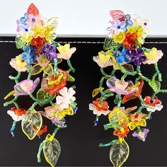 Add Some Playful And Colorful Flair To Your Outfit With These Beaded Flower Waterfall Statement Earrings! The Colorful Beaded Flowers Create A Fun And Eye-Catching Dangle Statement That Will Surely Make A Statement. (Warning: May Cause Compliments To Rain Down On You!) Multicolor Handmade Flower Earrings, Summer Multicolor Handmade Flower Earrings, Multicolor Beaded Flower Earrings For Spring, Spring Multicolor Beaded Flower Earrings, Colorful Beaded Flower Earrings For Party, Flower-shaped Earrings With Colorful Beads For Party, Flower Shaped Earrings With Colorful Beads For Party, Party Flower Earrings With Colorful Beads, Bohemian Multicolor Handmade Flower Earrings