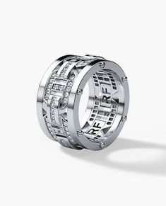 a diamond set wedding ring with the words forever written on it's side and two rows