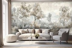 a living room with a couch, chair and wall mural