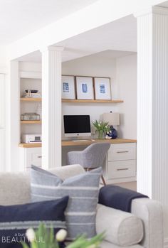 a living room filled with furniture and decor