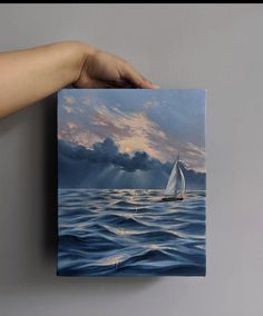 a painting of a sailboat in the ocean with clouds and sun shining through it