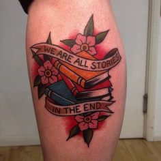 we are all stories in the end tattoo design on leg with flowers and books wrapped around it