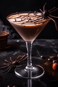 A delicious Spider Bite Martini cocktail, featuring vodka, creme de cacao, and cream. This pin showcases a simple recipe for a sweet and creamy drink perfect for gatherings or celebrations.