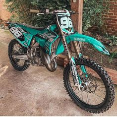 a dirt bike parked in front of a building