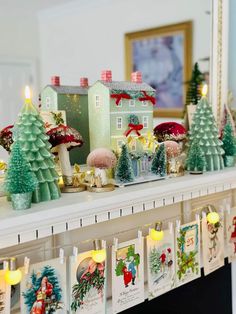 a fireplace mantle with christmas decorations on it