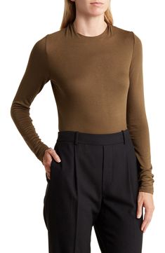 Refresh your wardrobe with this draped mock-neck top cut from a soft, lightweight knit with an easy back-zip closure. 23" length (size Small) Back zip closure Mock neck Long sleeves 98% rayon, 2% spandex Machine wash, dry flat Imported Model stats: 5'10" height, 32" bust, 25" waist, 36" hip. Model is wearing size Small. Versatile Mock Neck Top For Fall, Sleek Funnel Neck Tops For Fall, Chic Fall Turtleneck In Elastane, Chic Turtleneck With Thumbholes, Versatile Turtleneck For Work, High Neck Elastane Tops For Fall, Sleek Mock Neck Top For Workwear In Fall, Sleek Mock Neck Top For Fall Workwear, Sleek Fall Mock Neck Top For Workwear