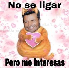 a man in a cat costume holding a heart with the caption, dimee un precio por tus beso