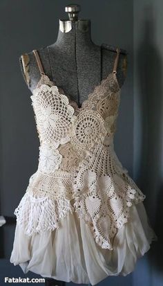 a white dress with lacy lace on it