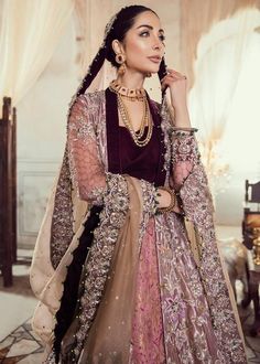 Pakistani Bridal Long Maxi with Embroidery with pretty Look emblazoned with beautiful embroidery, dabka and sequins. This lehnga is unique in style and have classy look and perfect choice for traditional bride. Maxi: Long maxi for bridal dress is in peach color is embellished with embroidery, silver kora, nakshi, stones, kamdani work. Neckline is decor with embroidery and with full length sleeves. Fabric used for maxi is chiffon. Maxi is in gown open style with velvet inner blouse. Lehnga: Styli Maxi Pakistani, Kamdani Work, Floral Sketch, Velvet Embroidery, Emerald Green Stone, Resham Embroidery, Organza Sleeves, Bridal Outfit, Traditional Bride