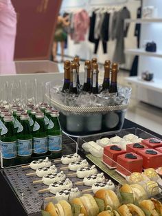 an assortment of food and drinks on display