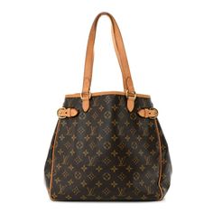 This is an authentic LOUIS VUITTON Monogram Batignolles Vertical. This shoulder bag is crafted of classic Louis Vuitton monogram-coated canvas. The bag features brass hardware and vachetta leather trim, including side belts and shoulder straps. The top is open to a cocoa brown fabric interior with zipper and patch pockets. Cocoa Brown, Brown Fabric, Brass Hardware, Leather Trim, Authentic Louis Vuitton, Luggage Bags, Leather Trims, Louis Vuitton Monogram, Shoulder Straps