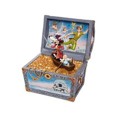 the tinker box has an image of peter panter and friends in it, as well as gold coins