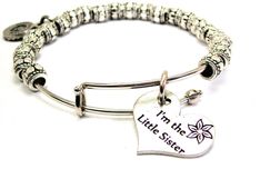 This is a beautifully crafted bangle, hand strung with metal beads and features a focal charm made of genuine American pewter. This bangle is expandable from 7-8" inches, making it one size fits most. All items are made right here in the USA. Our bracelets make a perfect gift for yourself or a loved one for any occasion. Adjustable Stainless Steel Beaded Bangle Bracelets, Adjustable Stainless Steel Beaded Bangle, Adjustable Stainless Steel Beaded Bracelet, Silver Stainless Steel Beaded Bracelets, Hypoallergenic Silver Stretch Bangle Bracelet, Adjustable Sterling Silver Stretch Bracelet Gift, Metal Stretch Bracelet With Round Beads For Gift, Adjustable Hypoallergenic Silver Stretch Bracelet, Adjustable Nickel Free Beaded Bracelet Gift